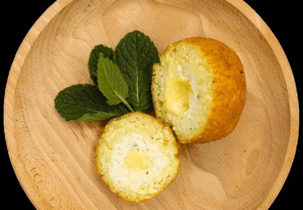 Arancini o arancine? Non importa come li chiamate, Ecco le 11 migliori versioni da gustare mentre in Sicilia
