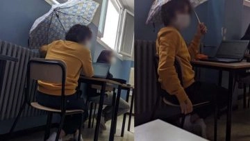 Anche se un giovane studente è entrato in classe, l’ombrello non lo chiude. In aula entra acqua in...