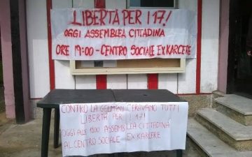 striscionisolidarietàexkarcere